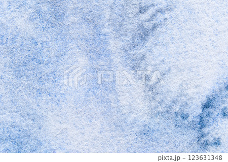 Close-up of blue textured canvas with soft patterns and abstract shadows Close-up of blue textured canvas with soft patterns and abstract shadows 123631348