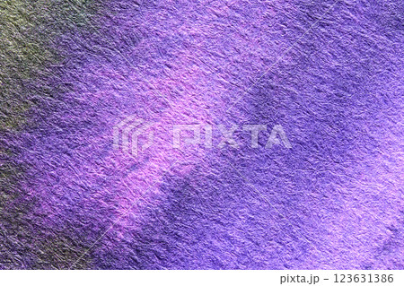 Textured abstract background in purple and pink tones with subtle fibrous 123631386