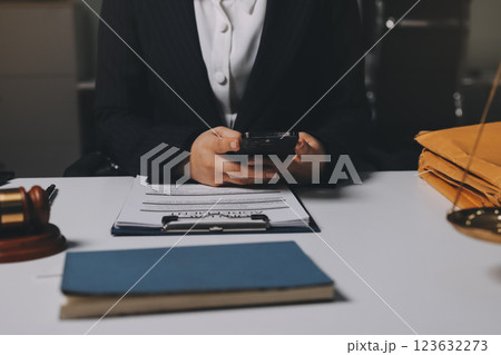 Judge gavel with Justice lawyers having team meeting at law firm background. Concepts of Law and Legal services. Judge gavel with Justice lawyers having team meeting at law firm background. Concepts of Law and Legal services. 123632273