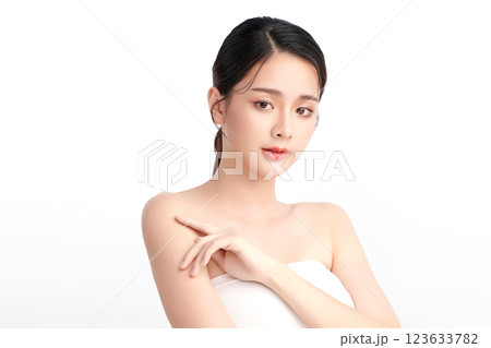 Beautiful young asian woman with clean fresh skin on white background, Face care, Facial treatment, Cosmetology, beauty and spa, Asian women portrait. Beautiful young asian woman with clean fresh skin on white background, Face care, Facial treatment, Cosmetology, beauty and spa, Asian women portrait. 123633782