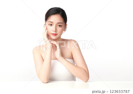 Beautiful young asian woman with clean fresh skin on white background, Face care, Facial treatment, Cosmetology, beauty and spa, Asian women portrait. Beautiful young asian woman with clean fresh skin on white background, Face care, Facial treatment, Cosmetology, beauty and spa, Asian women portrait. 123633787