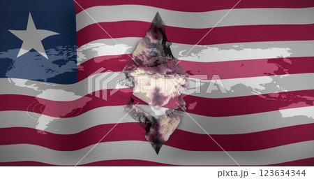 World map and diamond shape image over waving American flag 123634344
