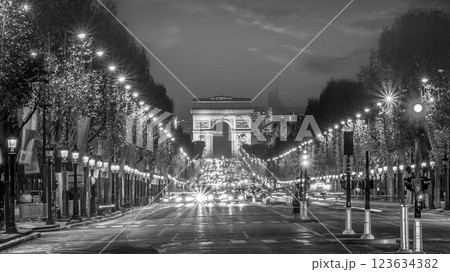 Road of Champs Elysee leading to Arc de Triomphe in Paris, France Road of Champs Elysee leading to Arc de Triomphe in Paris, France 123634382
