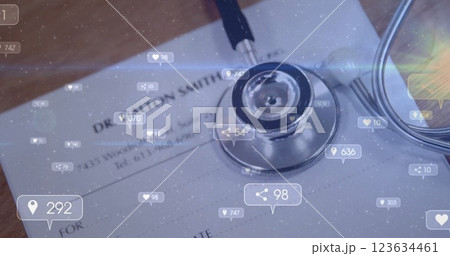Social media interaction icons image over stethoscope and medical document Social media interaction icons image over stethoscope and medical document 123634461