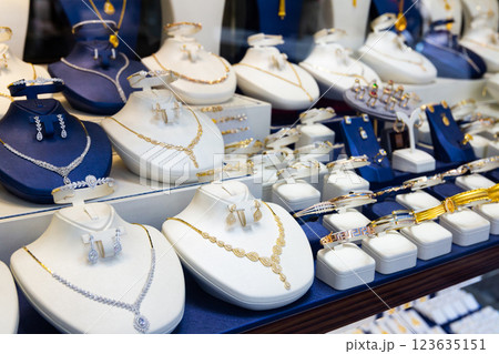 Display window with expencive gold jewelry Display window with expencive gold jewelry 123635151