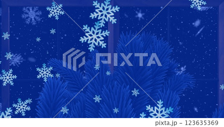 Image of snow falling over christmas tree branches decoration and winter scenery 123635369
