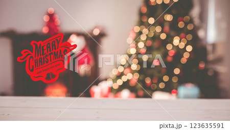 Image of merry christmas text over christmas tree 123635591