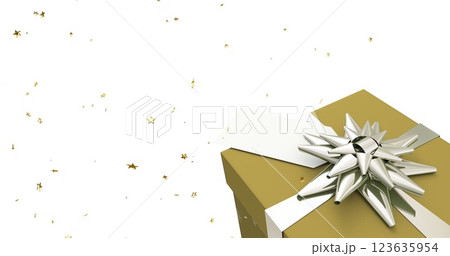Image of falling gold stars with gold christmas gift on white background 123635954
