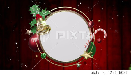 Image of snow falling over christmas decorations around white circular sign on red boards 123636021