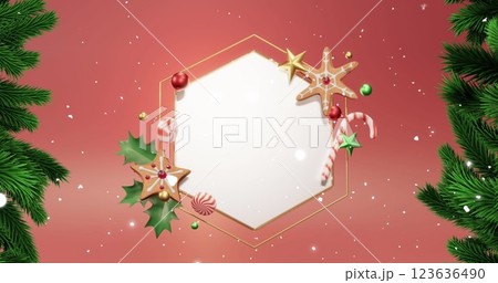 Image of snow falling and fir tree over hexagon with copy space on red background 123636490