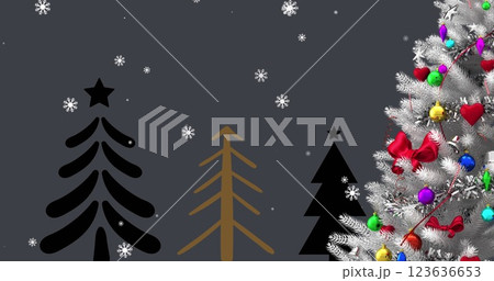 Image of snow falling over christmas trees and decorations Image of snow falling over christmas trees and decorations 123636653