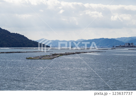 【広島宮島口 宮島口JR西日本宮島フェリーからの蠣いかだ】 【広島宮島口 宮島口JR西日本宮島フェリーからの蠣いかだ】 123637737