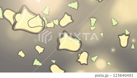 Image of christmas tree and bell icons over spots of light on purple background with copy space 123640491