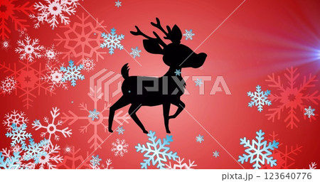 Image of fawn walking with lens flare with snowflakes against red background Image of fawn walking with lens flare with snowflakes against red background 123640776