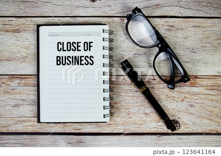 Close of Business (COB) text on notepad, Business and Financial concept background 123641164