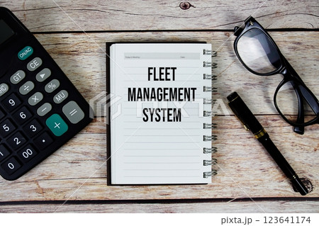 Fleet Management System (FMS) text on notepad, Business and Financial concept background 123641174