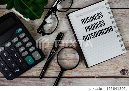 Business Process Outsourcing (BPO) text on notepad, Business and Financial concept background Business Process Outsourcing (BPO) text on notepad, Business and Financial concept background 123641205