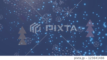 Image of snow falling over christmas trees in winter scenery Image of snow falling over christmas trees in winter scenery 123641486