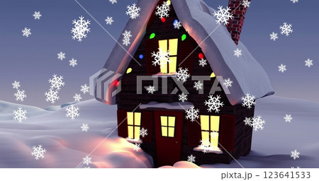 Image of christmas house with fairy light decorations with snow falling 123641533