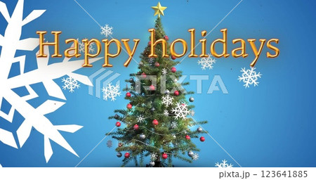 Image of happy holidays text and snow falling over christmas tree on blue background 123641885