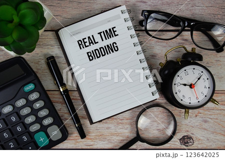 Real Time Bidding (RTB) text on notepad, Business and Financial concept background Real Time Bidding (RTB) text on notepad, Business and Financial concept background 123642025