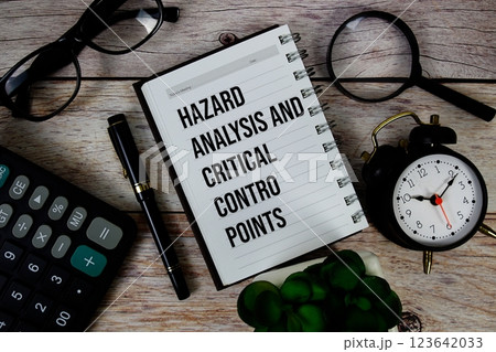 Hazard Analysis And Critical Control Points (HACCP) text on notepad, Business and Financial concept background 123642033