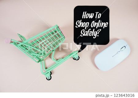 How To Shop Online Safely? text on speech bubble with optical mouse and trolley shopping cart on pink background How To Shop Online Safely? text on speech bubble with optical mouse and trolley shopping cart on pink background 123643016