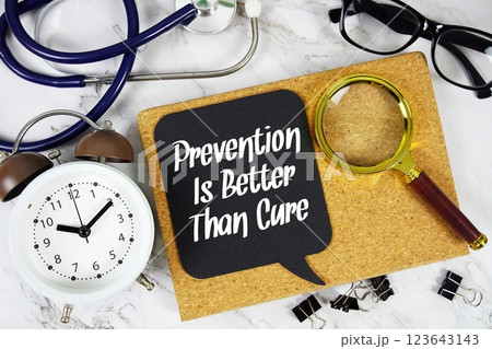 Prevention Is Better Than Cure text on speech bubble with alarm clock, magnifying glass and stethoscope on marble background Prevention Is Better Than Cure text on speech bubble with alarm clock, magnifying glass and stethoscope on marble background 123643143