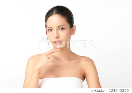Beautiful young asian woman with clean fresh skin on white background, Face care, Facial treatment, Cosmetology, beauty and spa, Asian women portrait. Beautiful young asian woman with clean fresh skin on white background, Face care, Facial treatment, Cosmetology, beauty and spa, Asian women portrait. 123643899