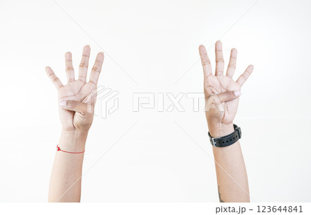 Hands counting number four. Woman hands showing number four isolated, Fingers counting number four 123644841