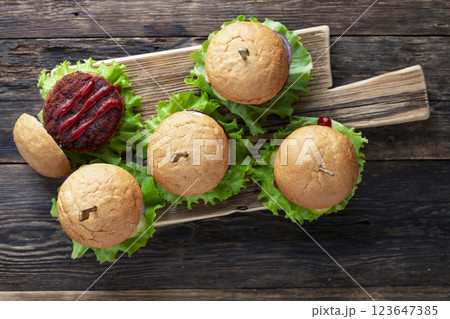 Tasty grilled home made burgers with beef Tasty grilled home made burgers with beef 123647385