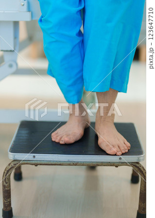 Senior asian Patient Woman step down and up the stairs bed in hospital. Female Elderly resting after surgery. Illness, treatment, Insurance, Health care and medical, world day of Sick and Health day 123647710