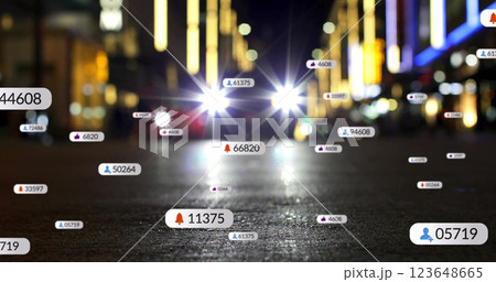 Image of social media icons with growing numbers over car on city street Image of social media icons with growing numbers over car on city street 123648665