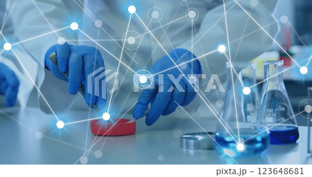 Image of network of connections over biracial male scientist 123648681