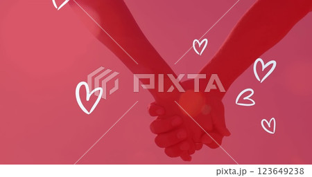Image of white hearts over caucasian couple holding hands Image of white hearts over caucasian couple holding hands 123649238