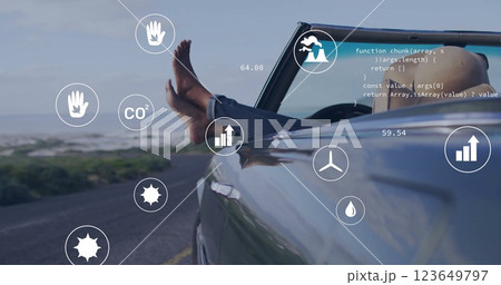 Environmental data and sustainability image over person relaxing in car by beach 123649797