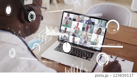 Image of financial data processing over african american man on laptop video call 123650117