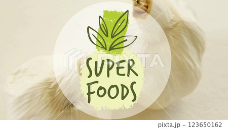 Image of super foods text over garlic on white background Image of super foods text over garlic on white background 123650162