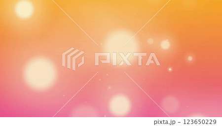 Image of glowing light spots over orange background Image of glowing light spots over orange background 123650229