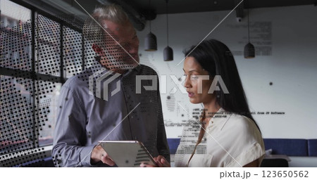 Image of world map and data processing over diverse business people in office 123650562