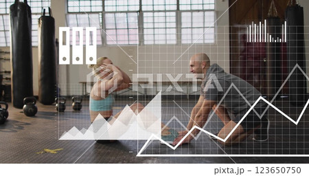Image of media icons and data over caucasian male instructor and woman training at gym 123650750