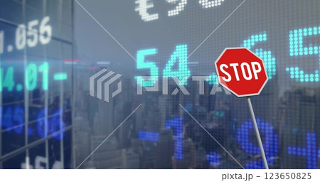 Image of financial data processing over stop road sign and city 123650825