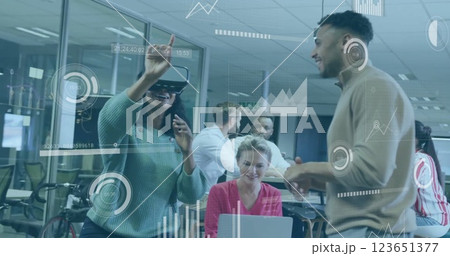 Image of financial data processing over diverse business people in office 123651377