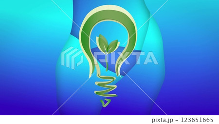 Image of lightbulb with plant over blue background 123651665