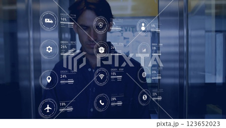 Image of icons and data processing over caucasian man working in warehouse 123652023