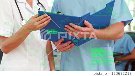 Image of data processing over caucasian doctors talking 123652218