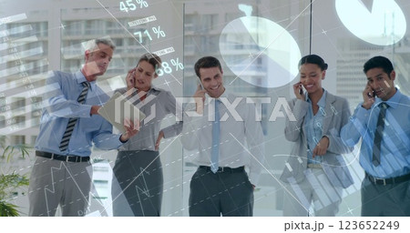 Image of financial data processing over diverse business people in office 123652249