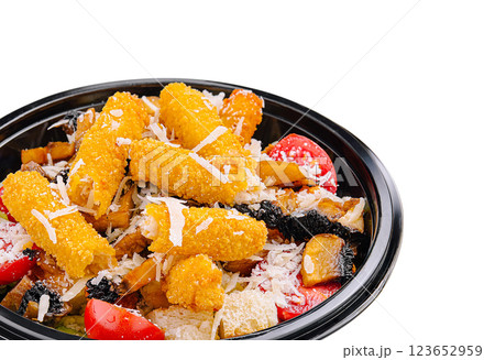 Crispy chicken tenders served with fresh vegetables and cheese Crispy chicken tenders served with fresh vegetables and cheese 123652959