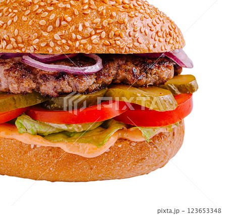 Juicy burger with fresh veggies and creamy sauce on sesame bun 123653348