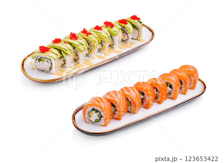 Delicious sushi rolls arranged on elegant platters for dining 123653422